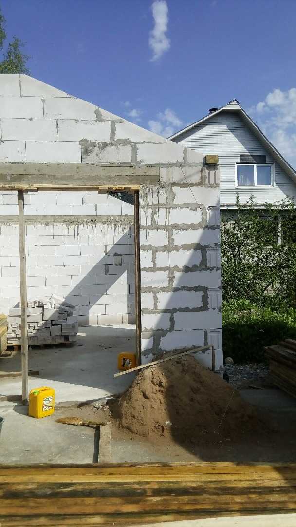 Проекты двухэтажных гаражей из пеноблоков. как пристроить гараж к дому из пеноблоков: конструктивные решения для разных типов построек