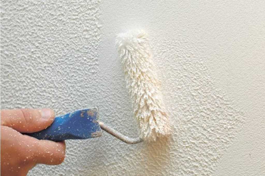 Структурная краска для стен: правила нанесения и преимущества